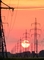 Sunset behind electricity lines