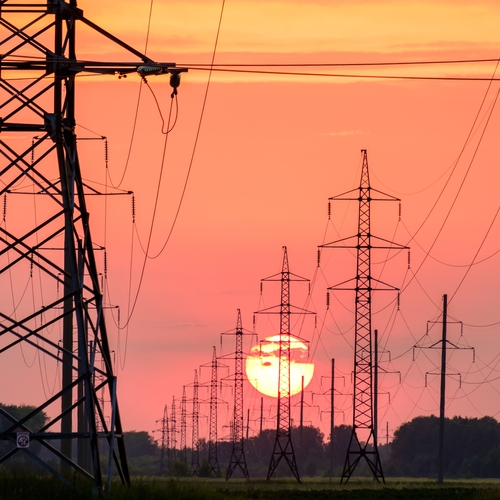 Sunset behind electricity lines