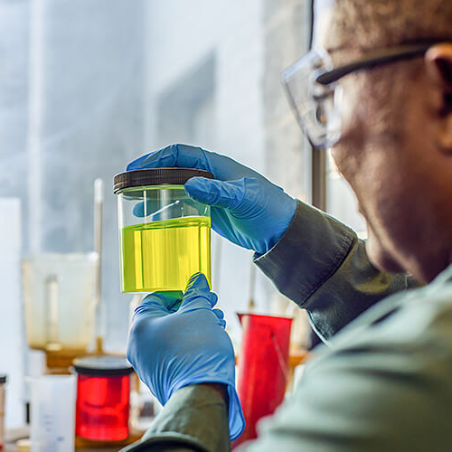 Scientist looks at newly made chemical to help farmers